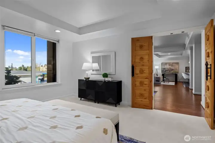 Wake up to a seamless flow from your private retreat to the heart of the home.