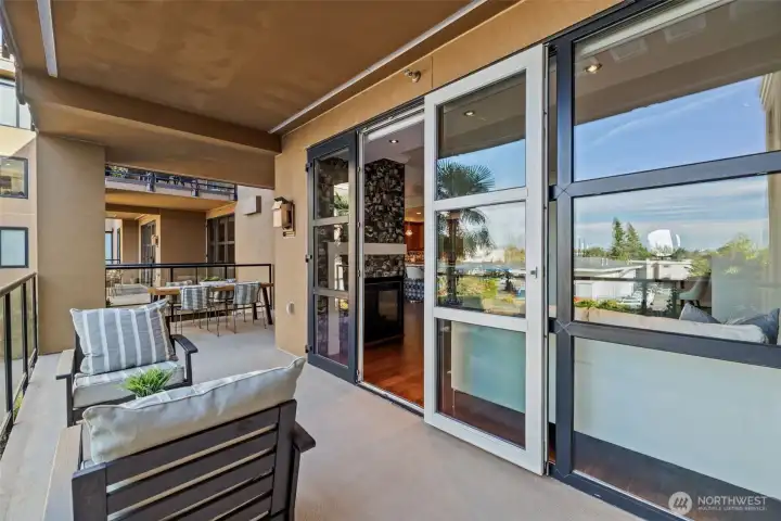 Unwind on the spacious deck—ideal for morning coffee or sunset views over the lake and city skyline.