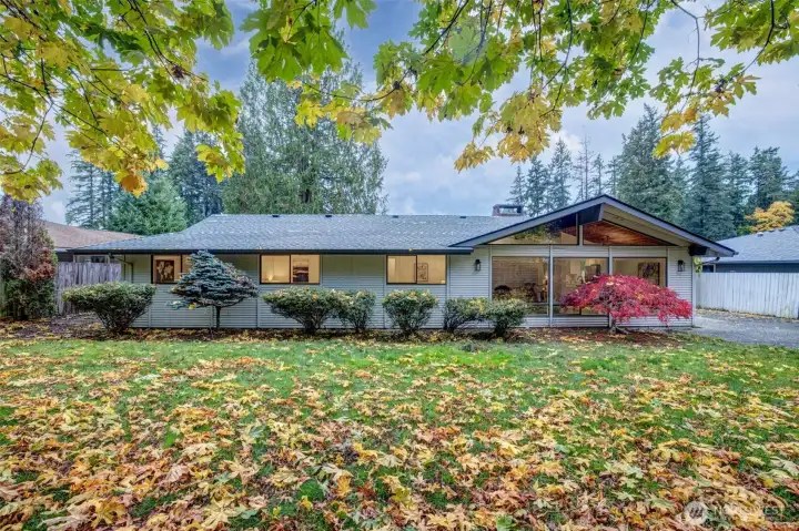 Backyard and Patio Escape, Step outside to your own park-like oasis—mature landscaping, vibrant seasonal color, and plenty of space to entertain or unwind.