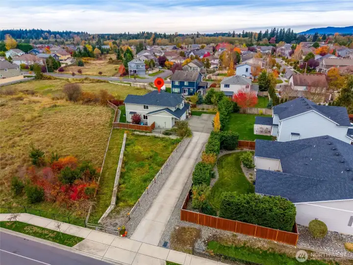 Big driveway, home is surrounded on 3 sides by State, City, and Neighborhood Green Space!
