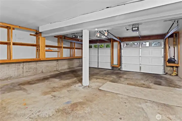 Double-car garage with door to the back yard, lots of built-in storage