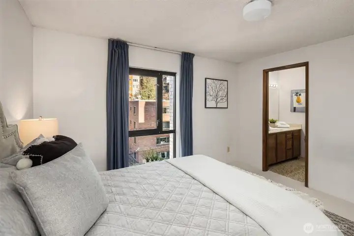 Spacious primary bedroom with bath