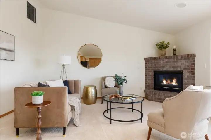 Spacious living room with a fireplace.