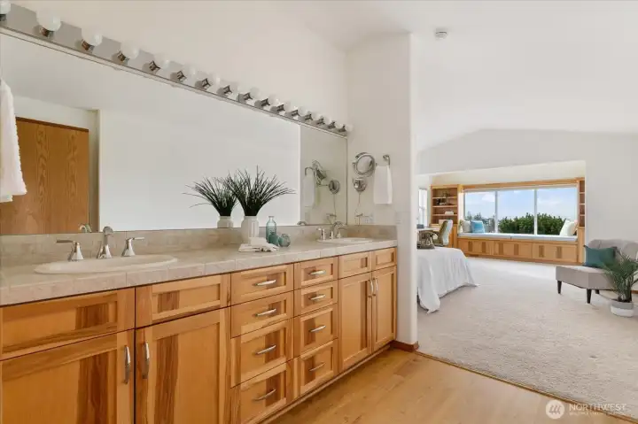 Incredible primary suite with walk-in shower and toilet behind. You may never leave!