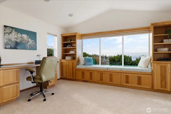 Office space in the primary suite with beautiful built-ins and an epic window seat.