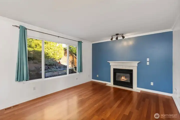 Gas fireplace in family room near kitchen for cozy nights in