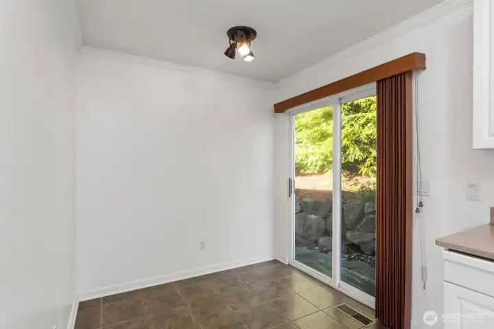 Separate dining space with slider door to patio