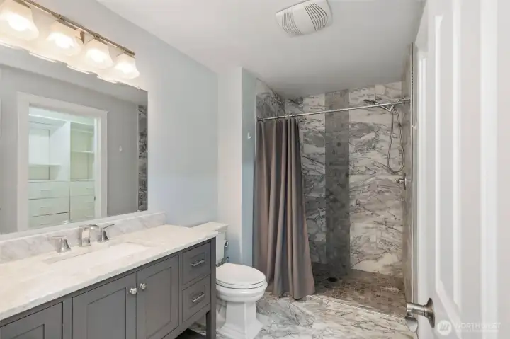 3/4 bathroom attached to the primary suite