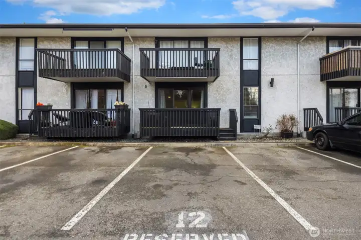 Parking spot adjoins condo entrance from deck