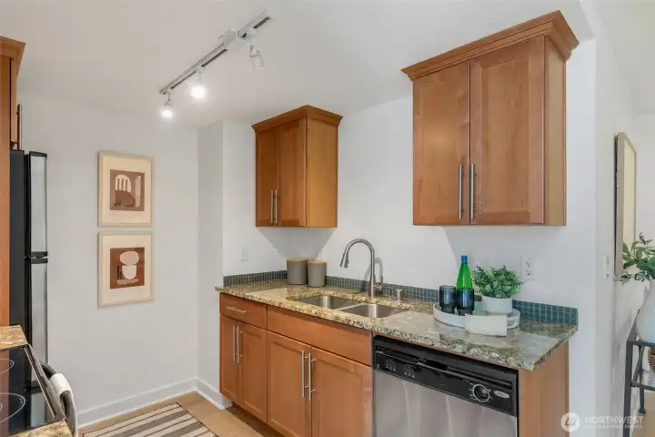 Kitchen has plenty of counter and cabinet space.