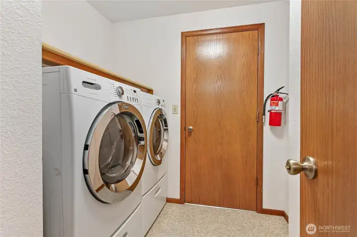 Laundry room with a door to the garage