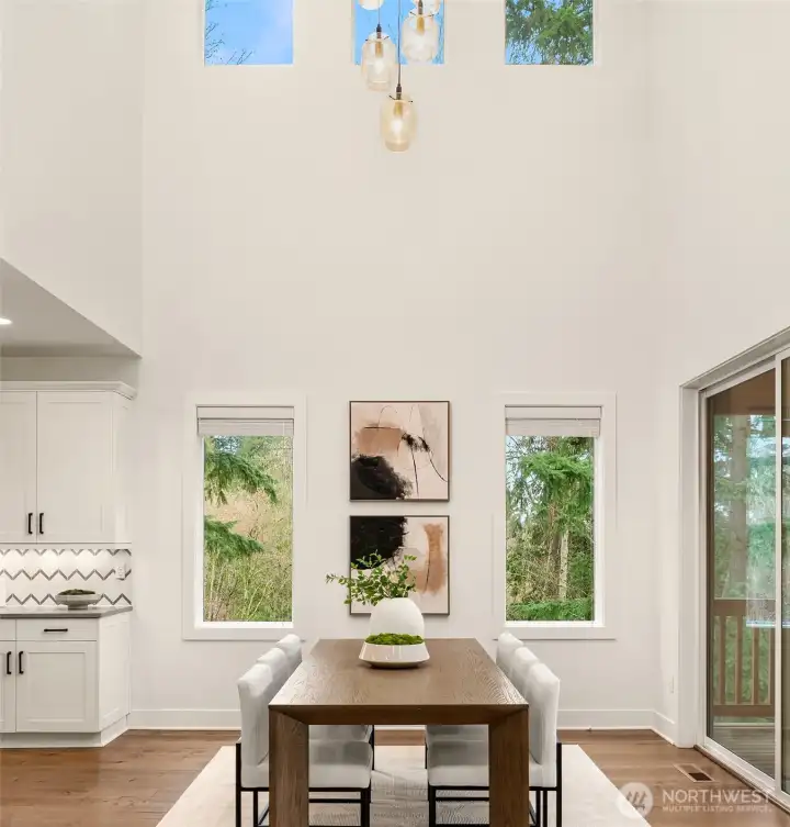 Dining area with vaulted ceiling