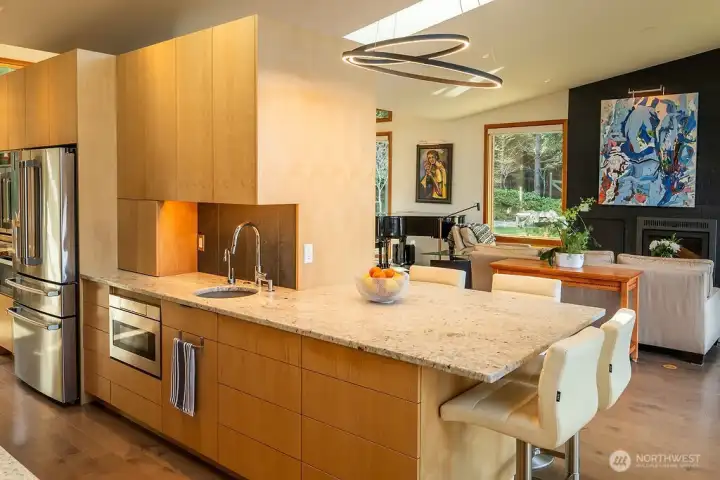 Kitchen eating area, with granite counters, custom cabinets.