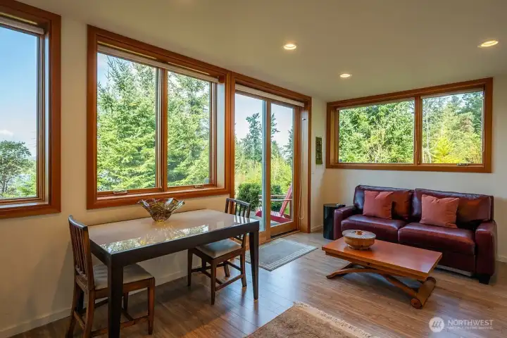 The lower level guest suite can be accessed through the home or by a private entrance reached by a path from the driveway.