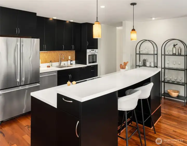 The eat-in kitchen has ample storage for your culinary needs. There is an additional walk-in pantry for extra storage.