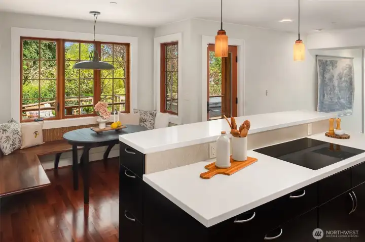 A sweet window seat is a picturesque spot for coffee, tea, meals, or an impromptu work spot.