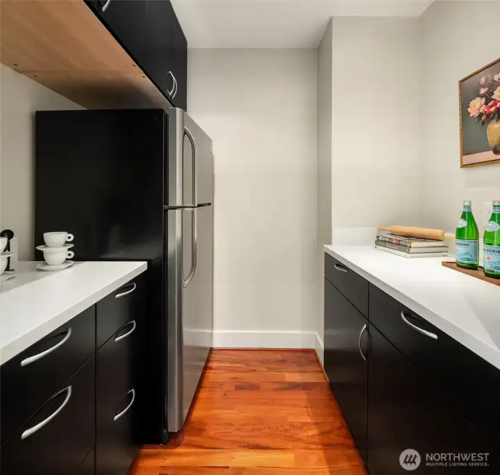 Walk-in pantry just off the kitchen. Bonus second fridge!!