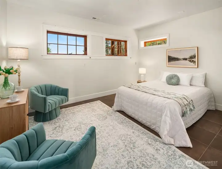 A finished bonus room, with a private 3/4 bathroom, is accessed through the attached garage.