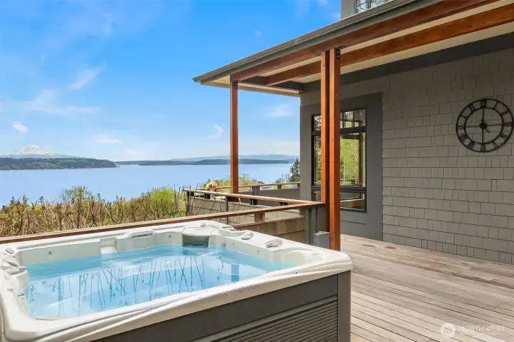 The hot tub looks southeast toward Maury Island, Normandy Park, and the east passage to Tacoma.