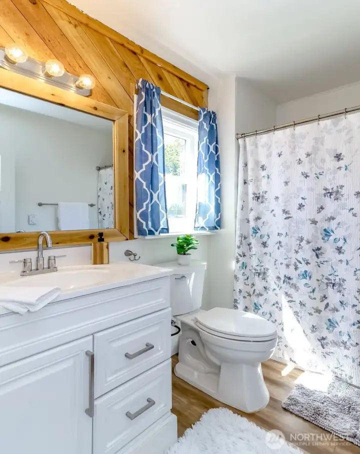 Bathroom features tub & shower!
