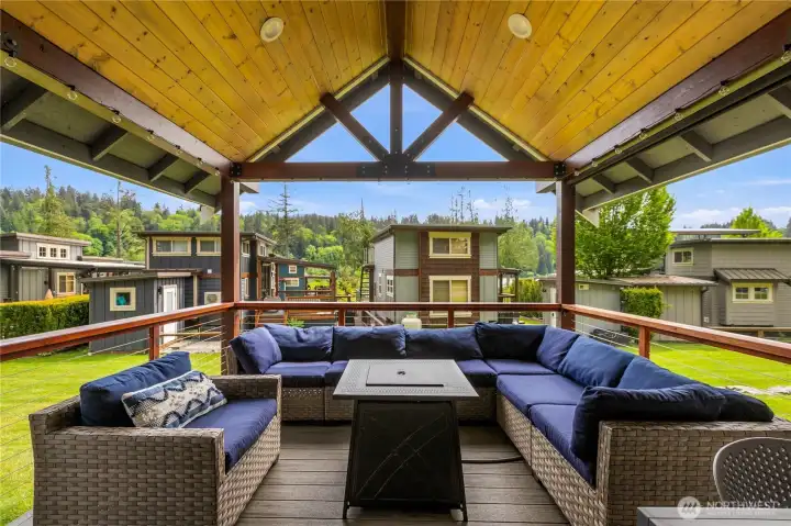 Vaulted covered deck creates an inviting outdoor retreat with flexible living space. Vaulted covered deck creates an inviting outdoor retreat with flexible living space.