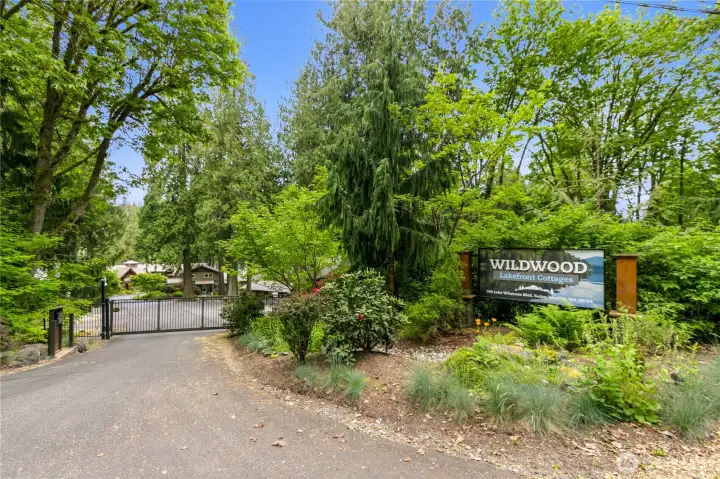 Gated entry welcomes you into Wildwood Lakefront Cottages, a private waterfront community surrounded by mature evergreens and Lake Whatcom scenery. Gated entry welcomes you into Wildwood Lakefront Cottages, a private waterfront community surrounded by mature evergreens and Lake Whatcom scenery.