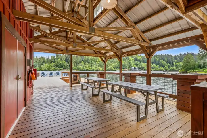 Covered waterfront pavilion provides gathering space directly on the lake with room to relax and enjoy the shoreline setting. Covered waterfront pavilion provides gathering space directly on the lake with room to relax and enjoy the shoreline setting.