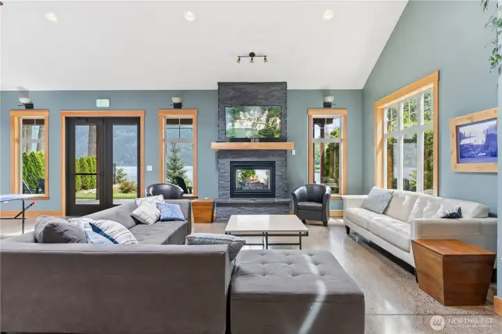 Lakefront clubhouse features vaulted ceilings, large windows, and comfortable gathering areas designed for relaxation and social connection. Lakefront clubhouse features vaulted ceilings, large windows, and comfortable gathering areas designed for relaxation and social connection.