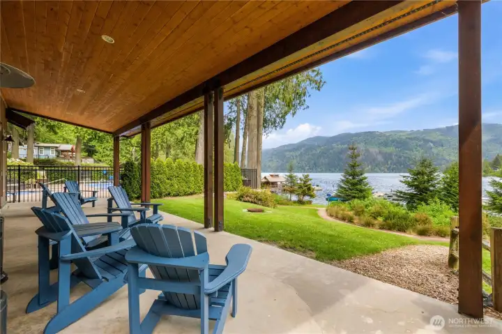 Covered outdoor patio creates an inviting setting to relax, unwind, or enjoy the peaceful lakefront surroundings year-round. Covered outdoor patio creates an inviting setting to relax, unwind, or enjoy the peaceful lakefront surroundings year-round.