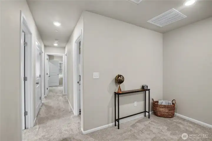upstairs landing area to additional three bedrooms