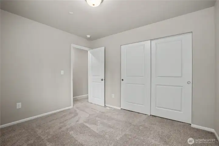 bedroom #3 with reach-in closet