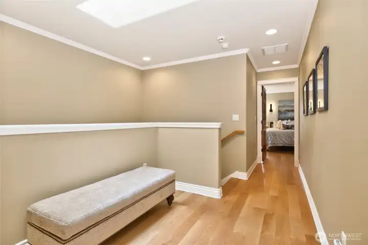 Sunny hallway with skylight separates the master wing from the 2nd and 3rd bedrooms. Sunny hallway with skylight separates the master wing from the 2nd and 3rd bedrooms.