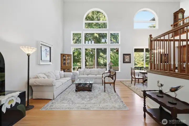 Wall of windows welcomes you to this light and bright home.