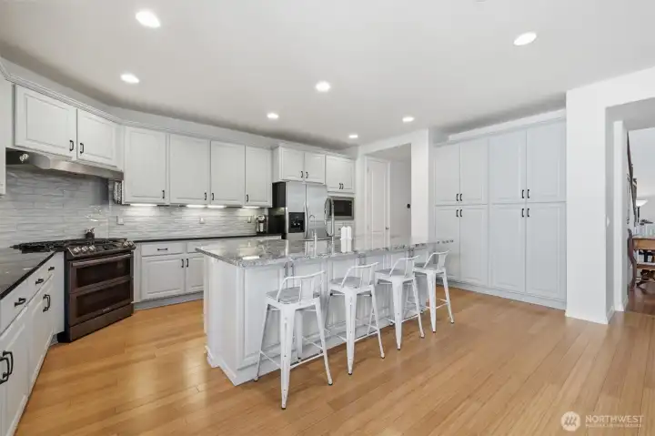 Large built-ins create extra pantry space right off the kitchen.