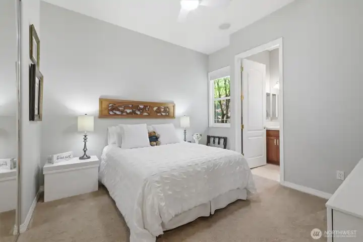 Main floor guest suite with private bathroom.