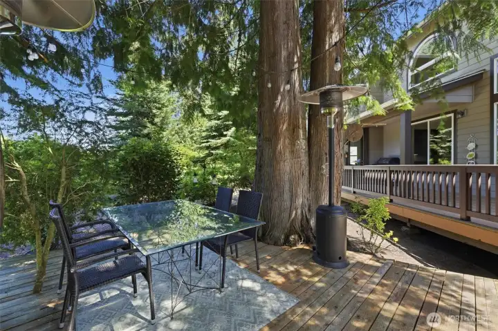 Extra decking space with more shaded dining space.
