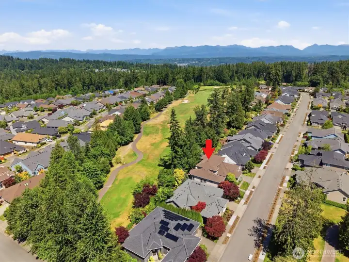 Home is located on the 6th fairway, but it's near the tee boxes and the hole angles away from the house so it doesn't get hit by golf balls.