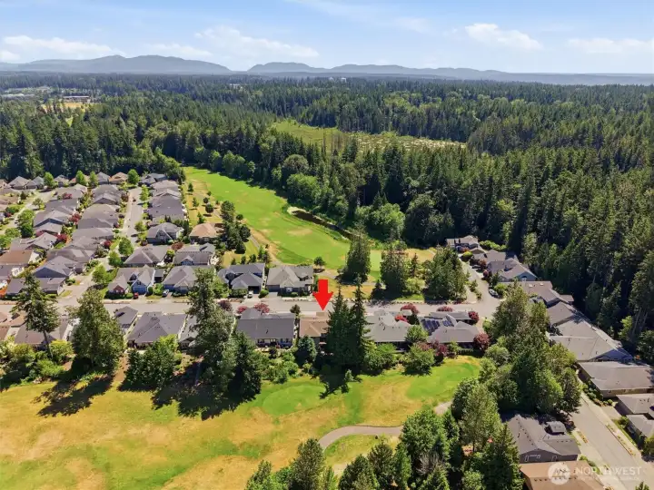 Views of the golf course from front yard and back yard.  Great location near the clubhouse via short neighborhood walk or via the nature trails.