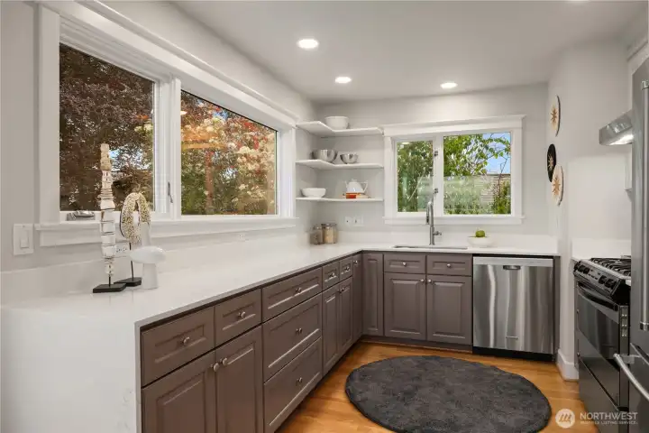 Newly updated kitchen with waterfall counters and new appliances Newly updated kitchen with waterfall counters and new appliances