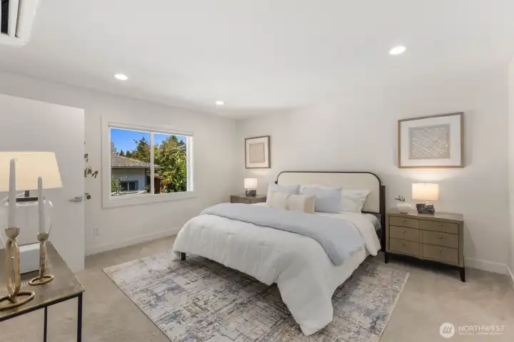 Spacious primary bedroom with walk in closet and ensuite bathroom. Spacious primary bedroom with walk in closet and ensuite bathroom.