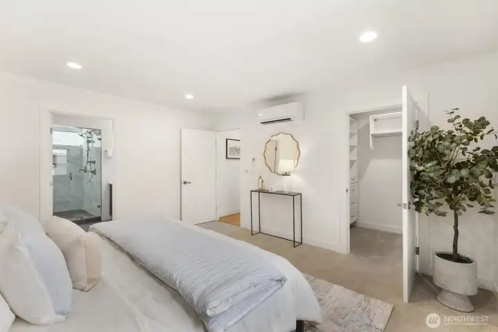 Primary suite with direct access to the bath and custom walk-in closet. Primary suite with direct access to the bath and custom walk-in closet.
