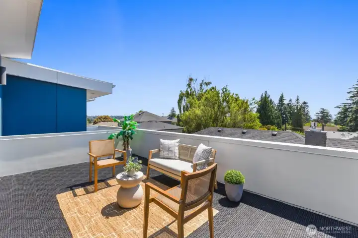 Rooftop deck offers multiple seating areas with views of the olympics and peakaboo views of the Sound. Rooftop deck offers multiple seating areas with views of the olympics and peakaboo views of the Sound.