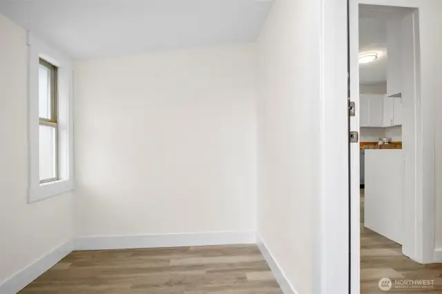 A spacious mudroom at the back of the house, you can enter into this area from the back door. Perfect place for shoes, coats, bikes, storage etc.