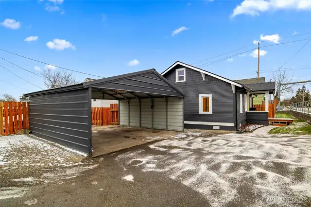 A huge covered carport sits right off the alley.