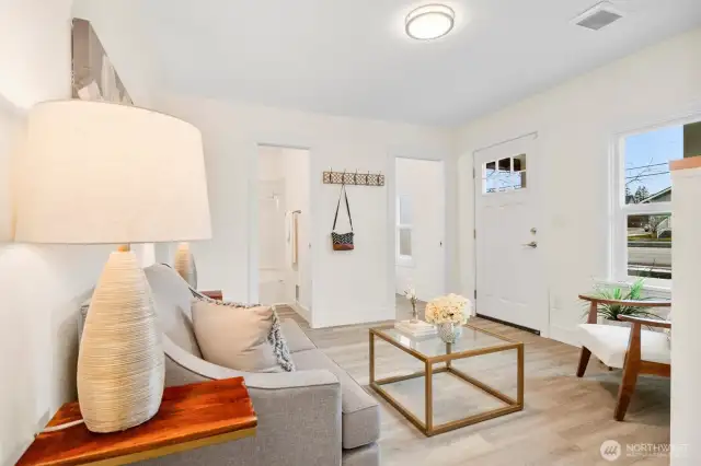 Another view of the sitting area, with a view to the 2 fully remodeled bathrooms.