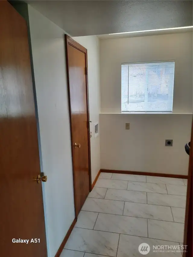 Laundry and third bathroom