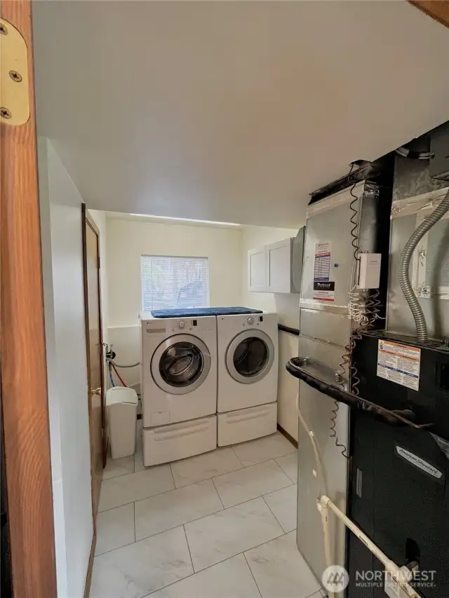 Laundry and third bathroom