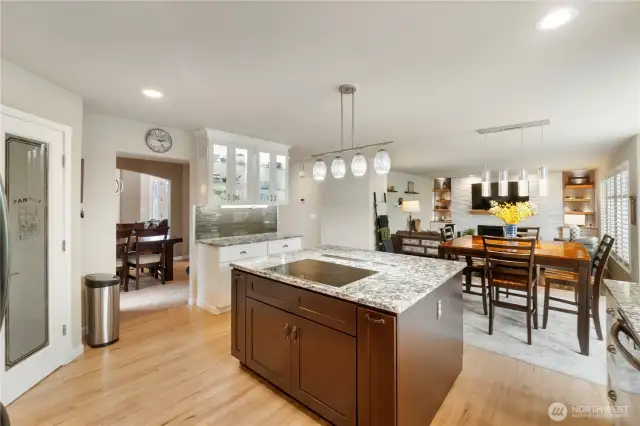 From coffee to cocktails. This stunning kitchen blends functionality and flair with endless counter space, smart layout, and a view out to the covered deck.
