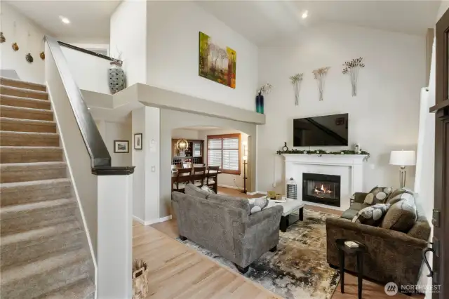 The welcome committee. Soaring ceilings, warm wood floors, and graceful details set the tone from the moment you open the door.