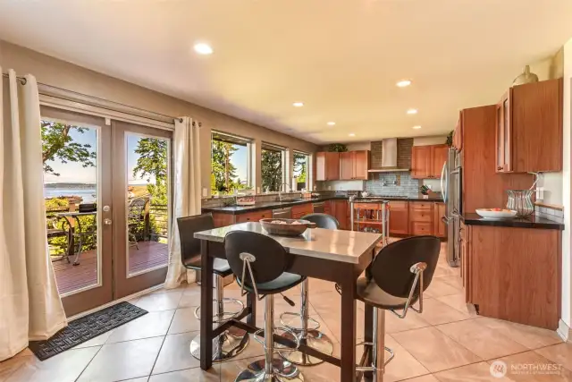 Kitchen offers casual space for breakfast & dining while enjoying the view!